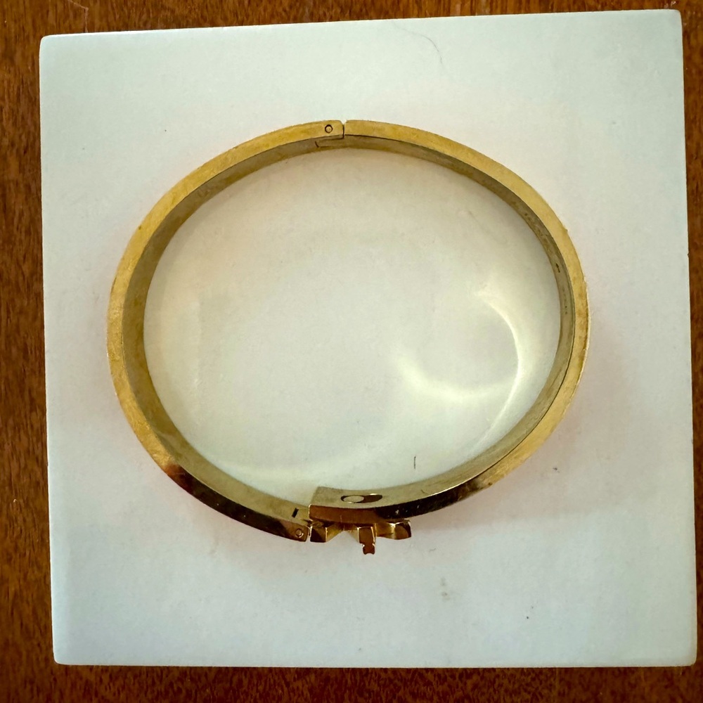 Michael Kors Bracelet. Gold and bright orange. Exactly like the pictures